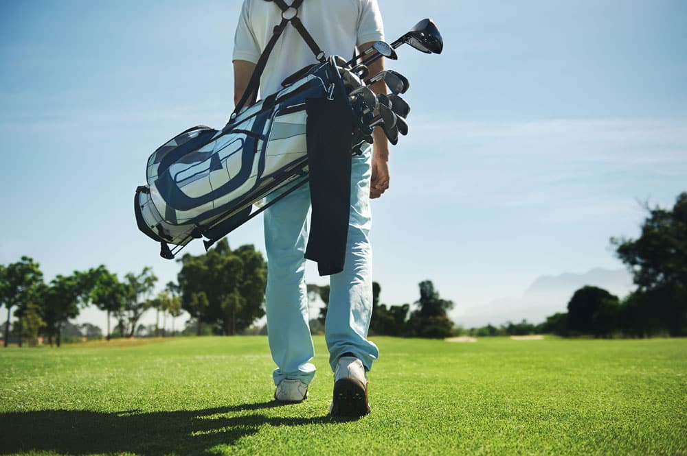Image of person playing golf